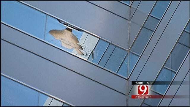 Construction Debris Falls From Devon Tower, Through Window Of Another Building
