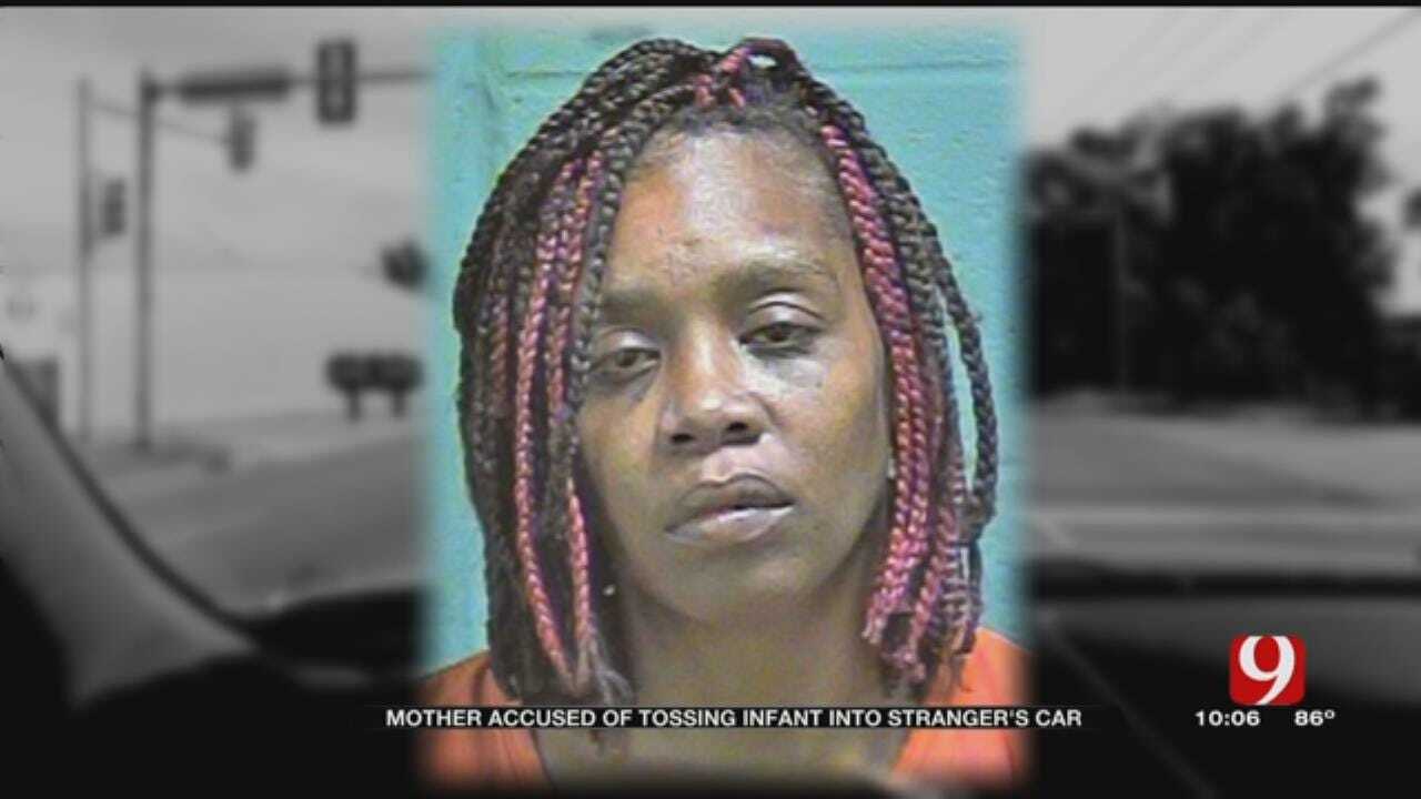 Woman Arrested, Accused Of Throwing Baby Into Vehicle