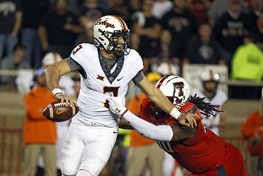 No. 9 Oklahoma St. In B12 Title Game With 23-0 Win Over Tech