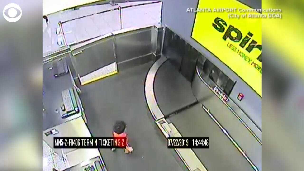 WATCH: Child Takes Ride On Baggage Conveyor Belt