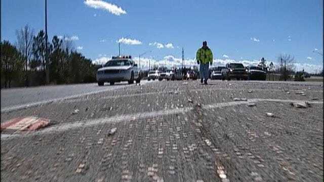 WEB EXTRA: Thousands Of Pennies Spilled On The Highway