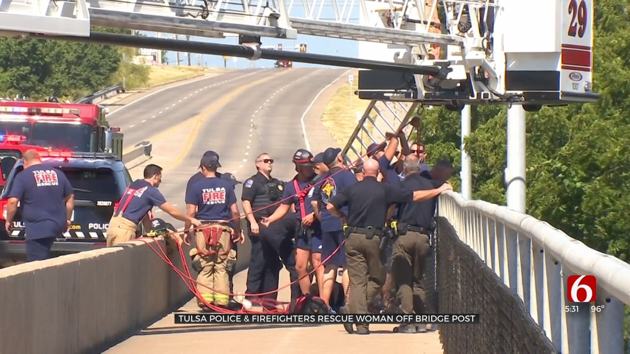 Tulsa Police, Firefighters Rescue Woman Off Bridge Post