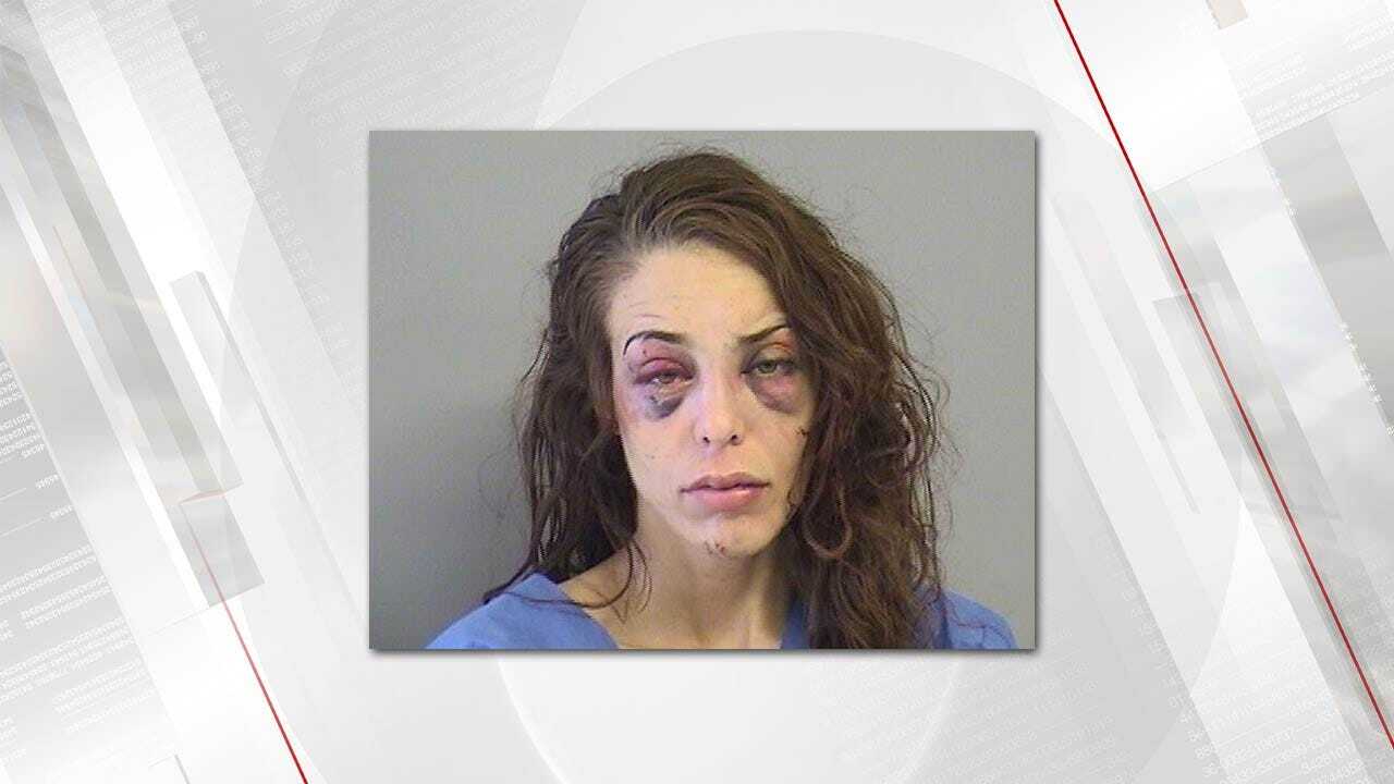Bixby Woman Accused Of Assaulting Officers With Knives, Bat