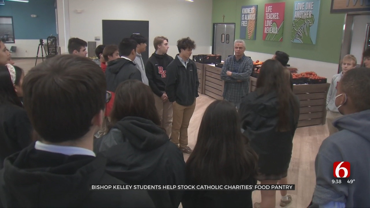 Students Help Stock Catholic Charities' Food Pantry On Ash Wednesday