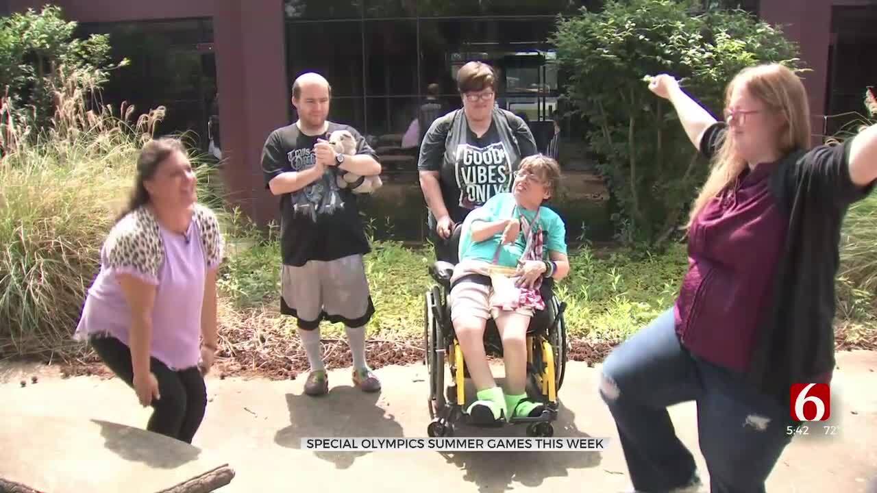 Group Of Adults With Disabilities To Cheer On Fellow Athletes At Special Olympics Summer Games