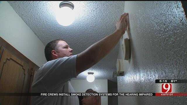 Metro Fire Crews Install Smoke Detectors For The Hearing Impaired