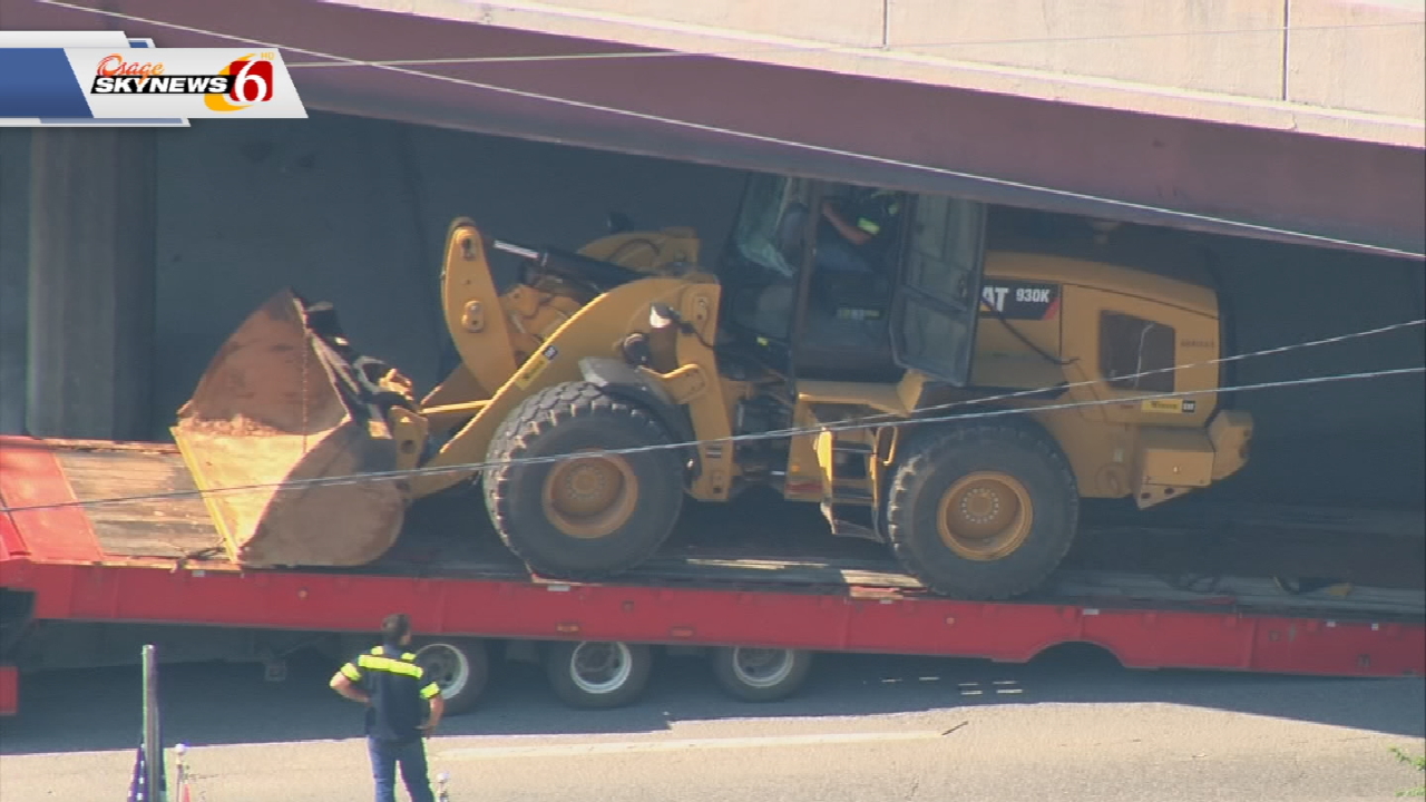 Roads Briefly Blocked As Truck Hauling Bulldozer Gets Stuck Under Tulsa Bridge