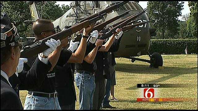 Crowd Marks Holiday At Memorial Park Cemetery In Tulsa