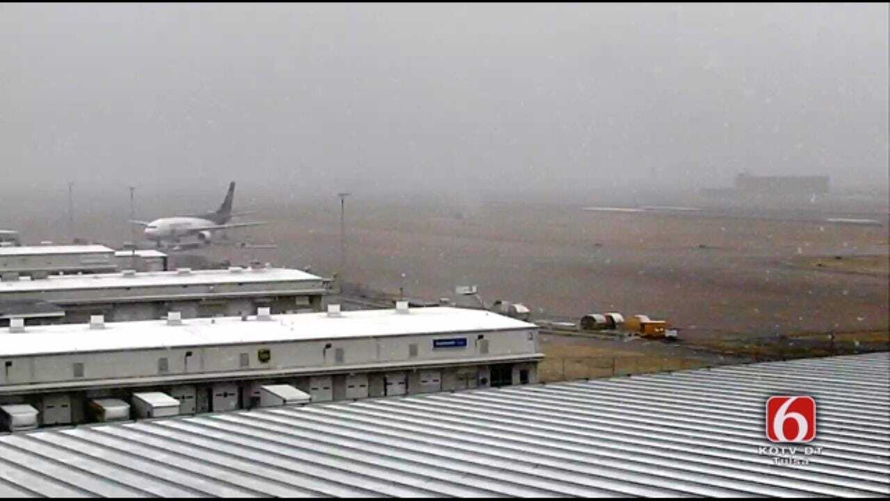 Snow Falls At Tulsa International Airport