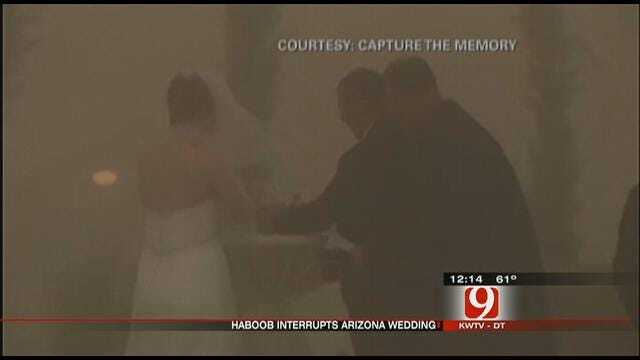 Huge Dust Storm Interrupts Wedding