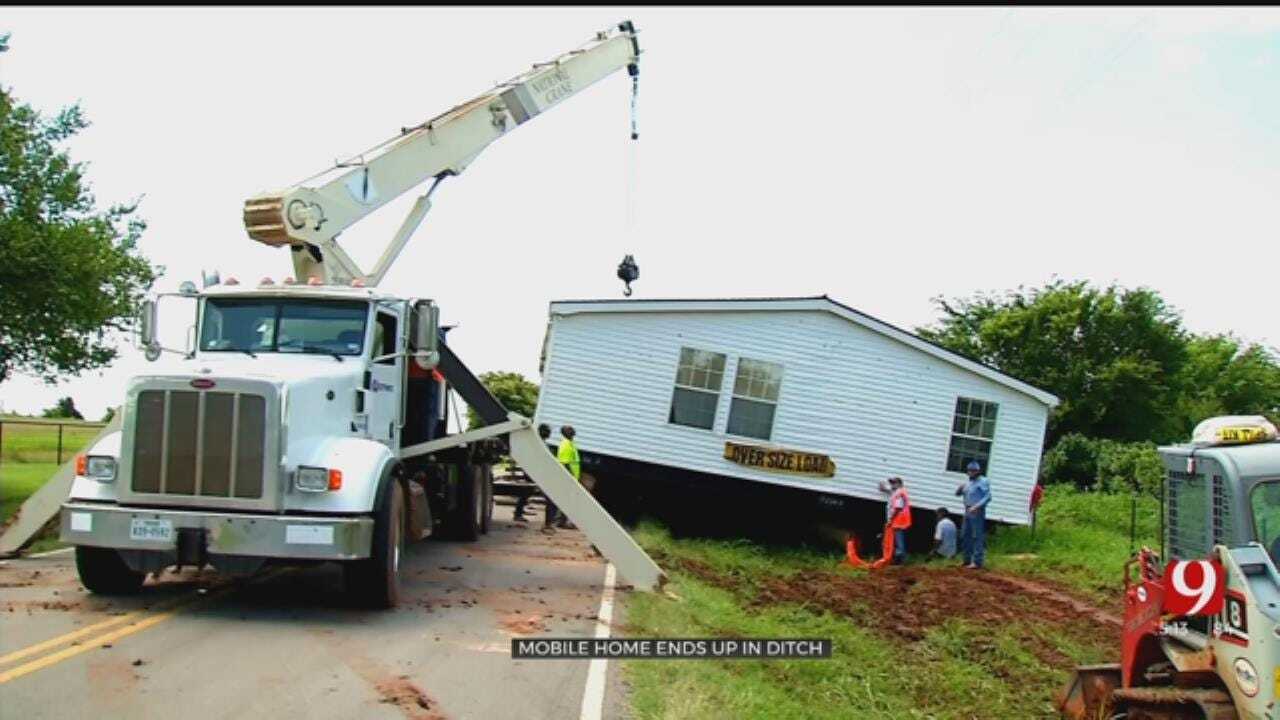 Mobile Home Ends Up In Ditch After Sliding Off Truck In Yukon
