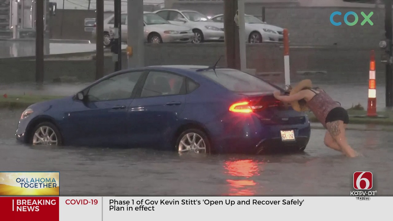 3 Women Join Forces To Push Elderly Couple’s Car Out Of Floodwaters