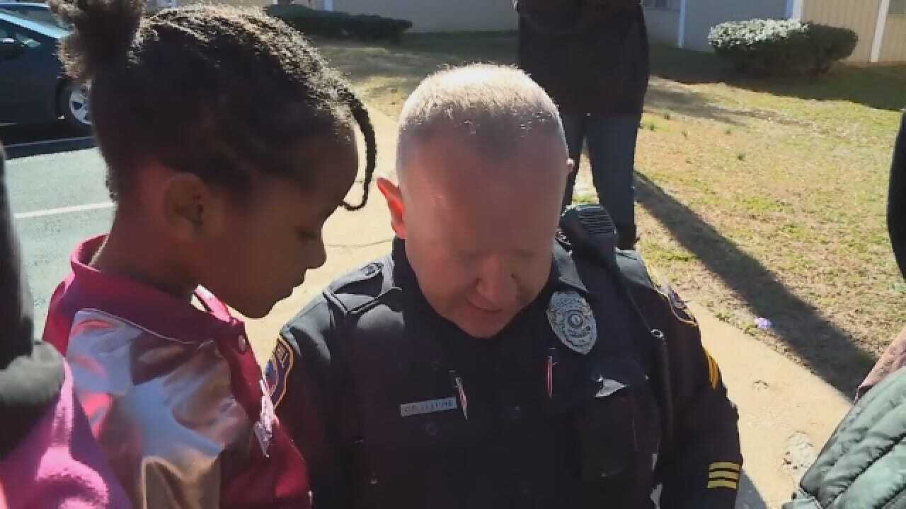 Mother Says Cop Changed Daughter's Life After Checking On Kids, Staying To Play