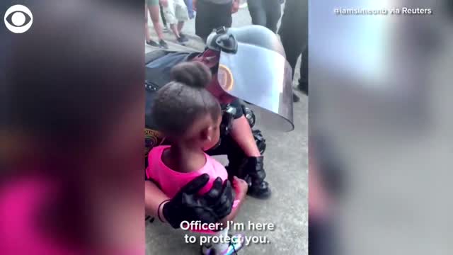 Houston Officer Comforts 5-Year-Old Girl During Protest
