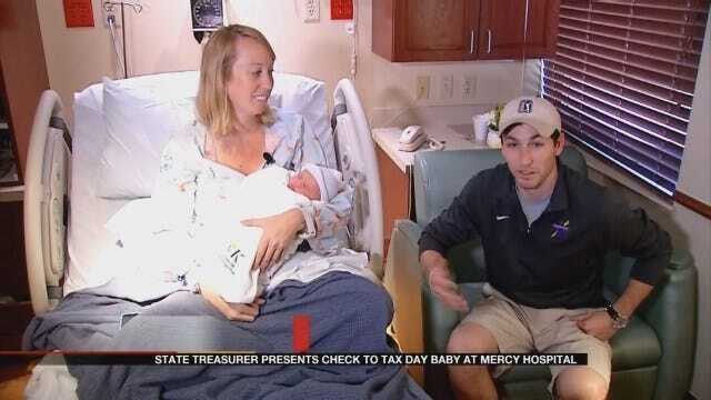 State Treasurer Presents Check To Tax Day Baby At Mercy Hospital