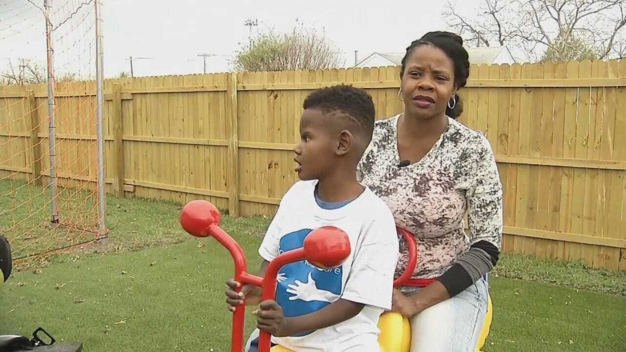 Special Kids Care Cuts Ribbon On New Special Needs Playground