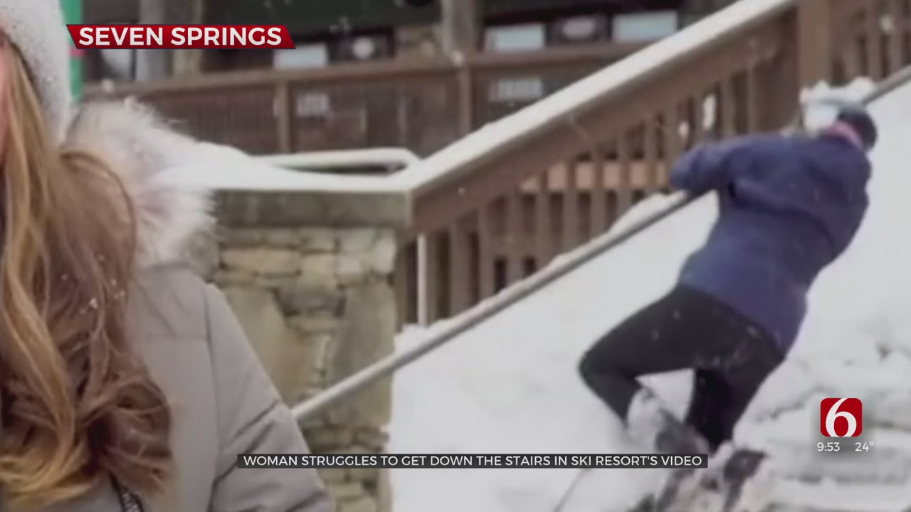 Woman Struggles To Get Down Stairs In Viral Ski Resort Video