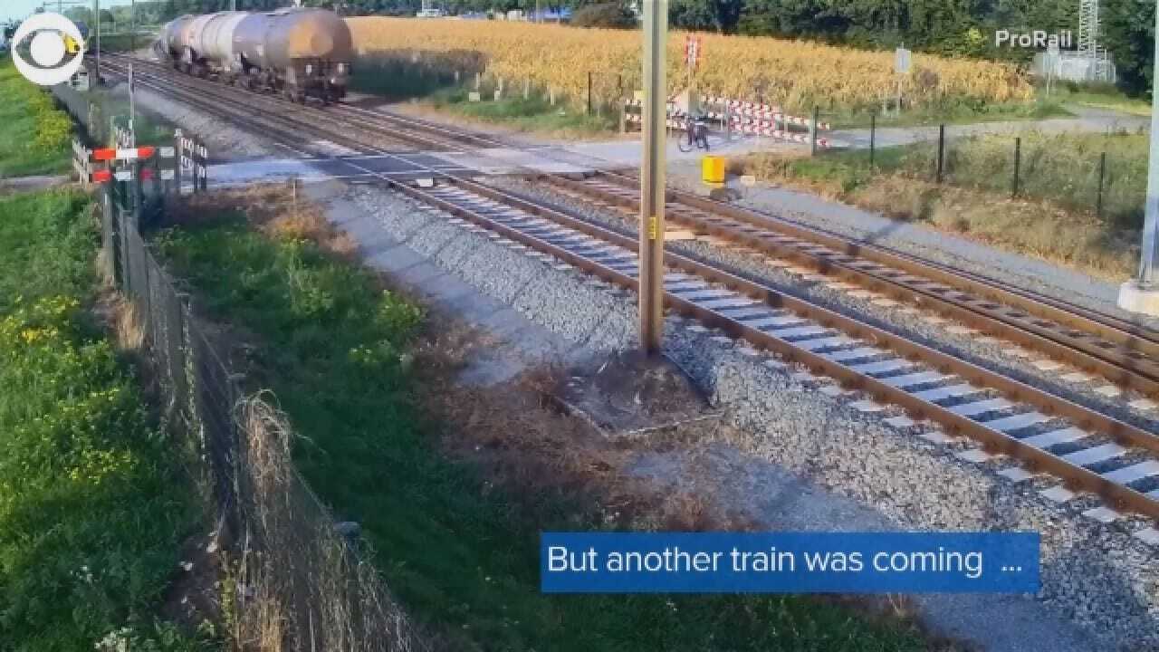 Caught On Video: Train Barely Misses Cyclist