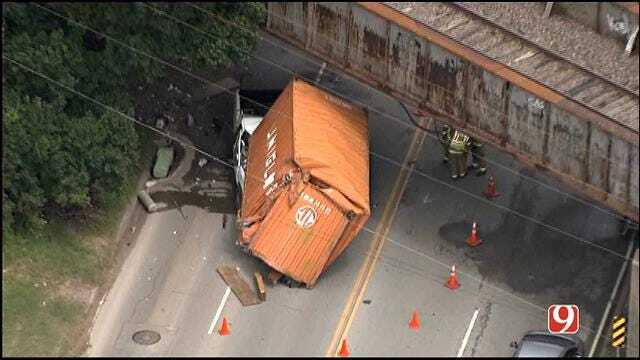 WEB EXTRA: Semi Loses Container, Crushes Truck