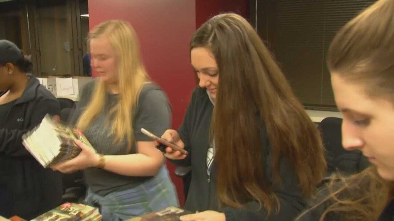 WEB EXTRA: Video Of ORU Students Sorting Through Book Donations