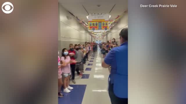 WATCH: Elementary School Students Cheer Cafeteria Manager After She Passes Her Citizenship Test