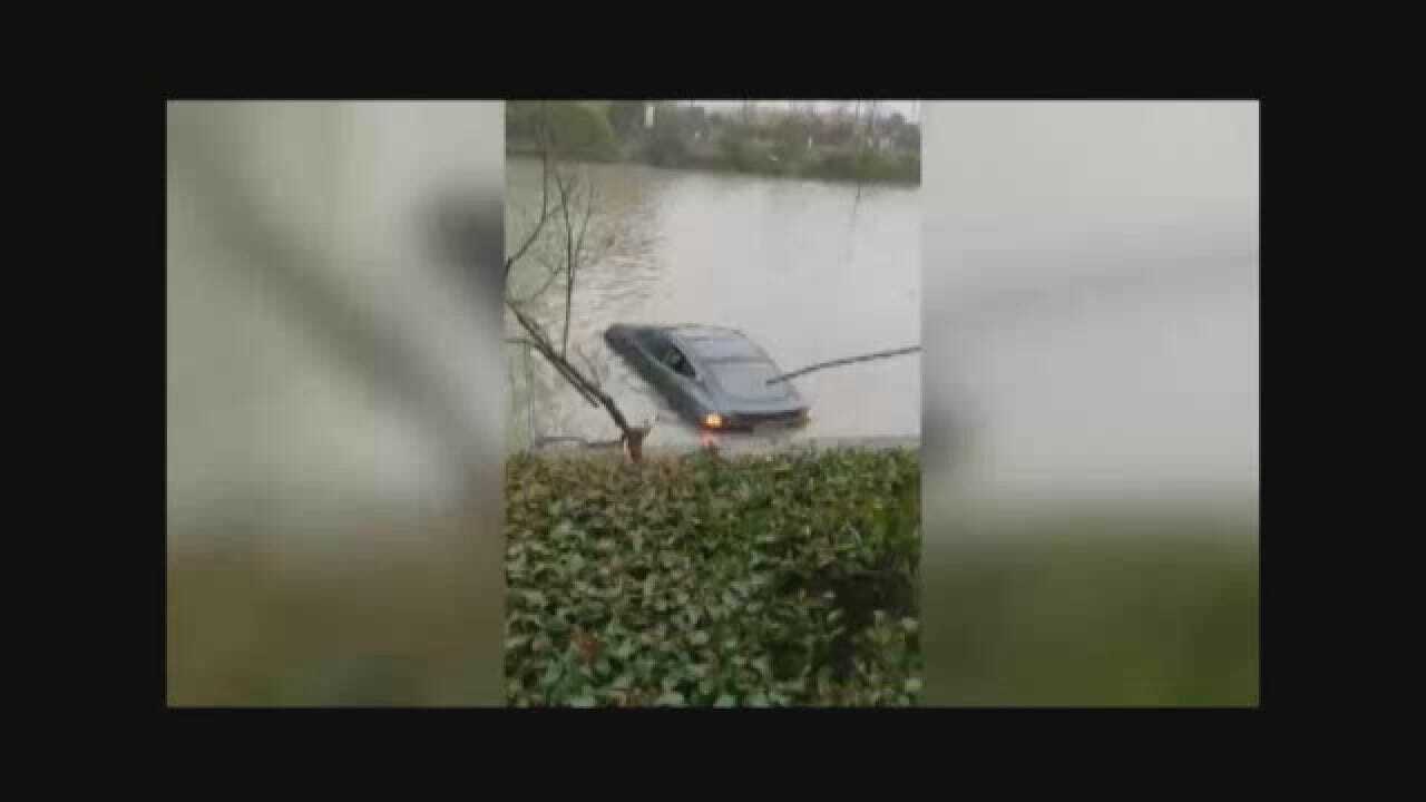Motorist Drives Tesla Into River In China
