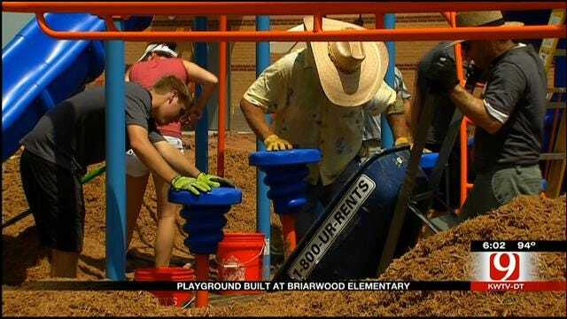 Volunteers Build New Playground For Briarwood Elementary School