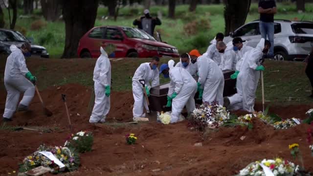 Brazil Digging Graves Around The Clock As It Faces Possible Worst Month Yet Of COVID Crisis