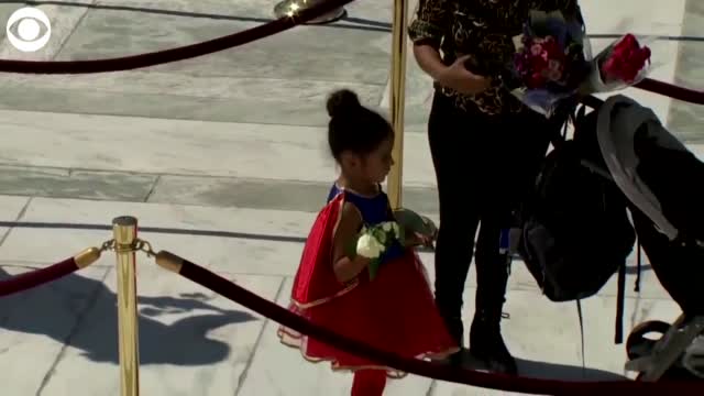 WATCH: Little Girl Dresses As Supergirl To Pay Respects To Justice Ginsburg
