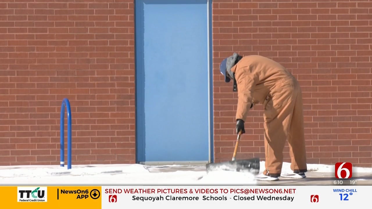 TPS Workers Clear Ice Outside Schools