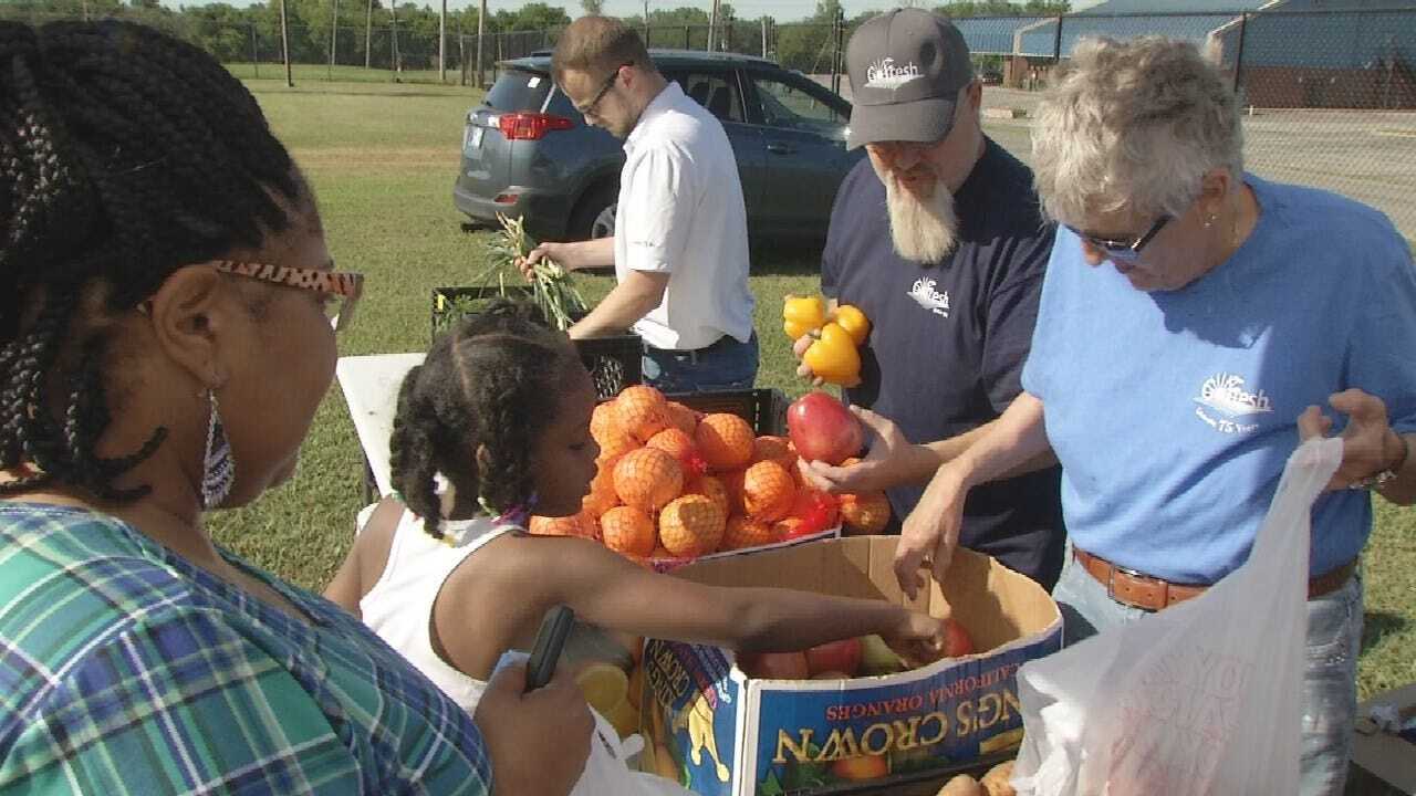 Food On The Move Partners With Tulsa Dream Center To Give Out Groceries