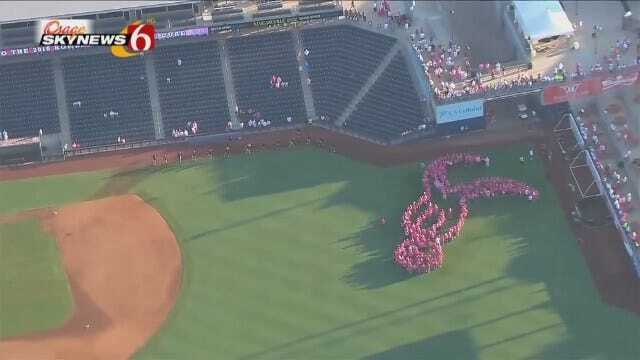 WEB EXTRA: Race For The Cure Survivors Form Giant Pink Ribbon At ONEOK Field