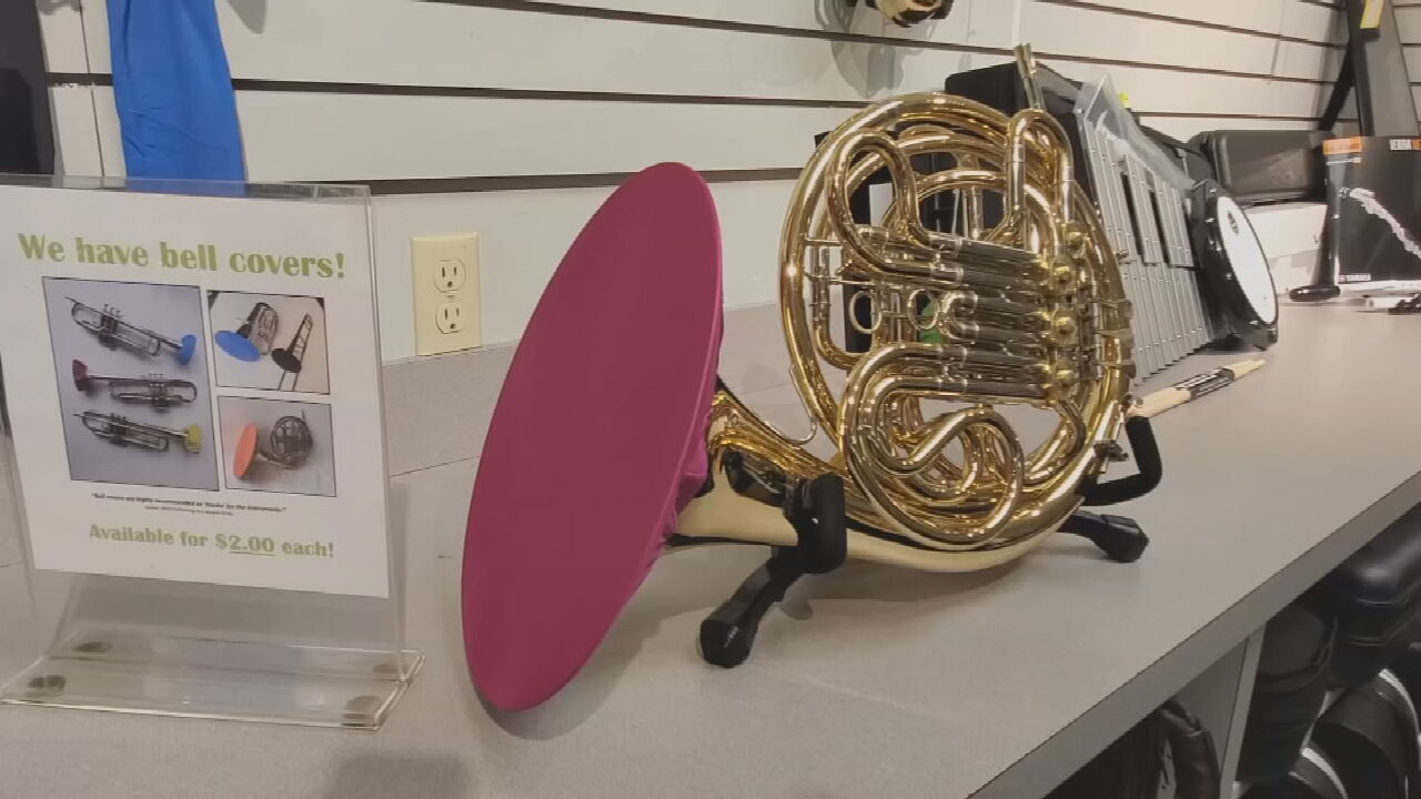 Music Store Using Textbook Covers For Modify Instruments