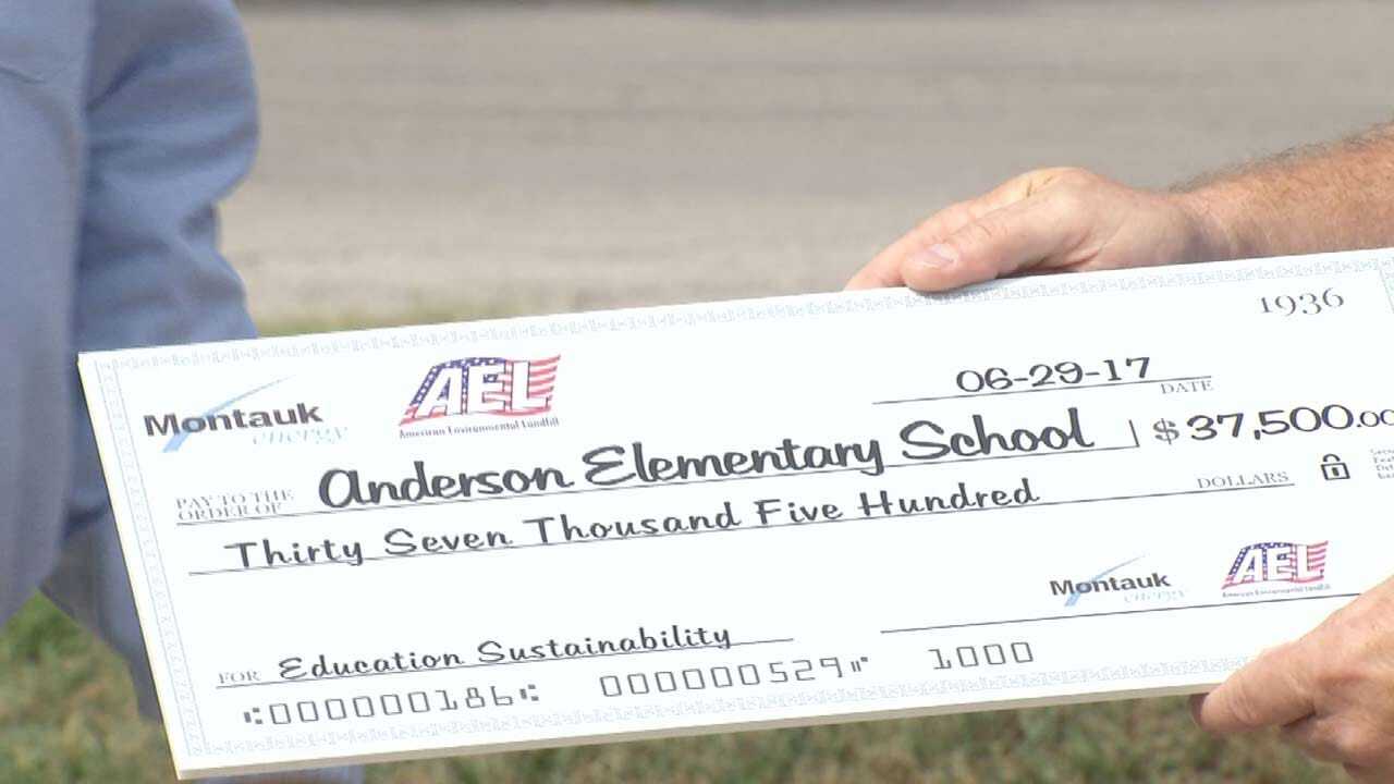 Businesses Give Donation To Sand Springs Elementary School