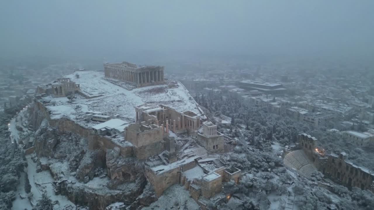 Greece: Snow Reaches Acropolis, Halts Services