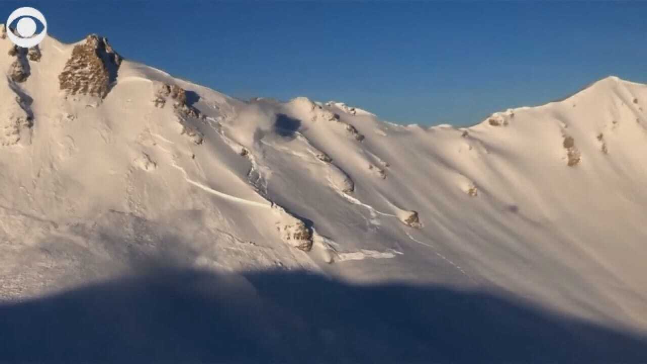 Helicopter Drops Explosives In 'Controlled Avalanche'
