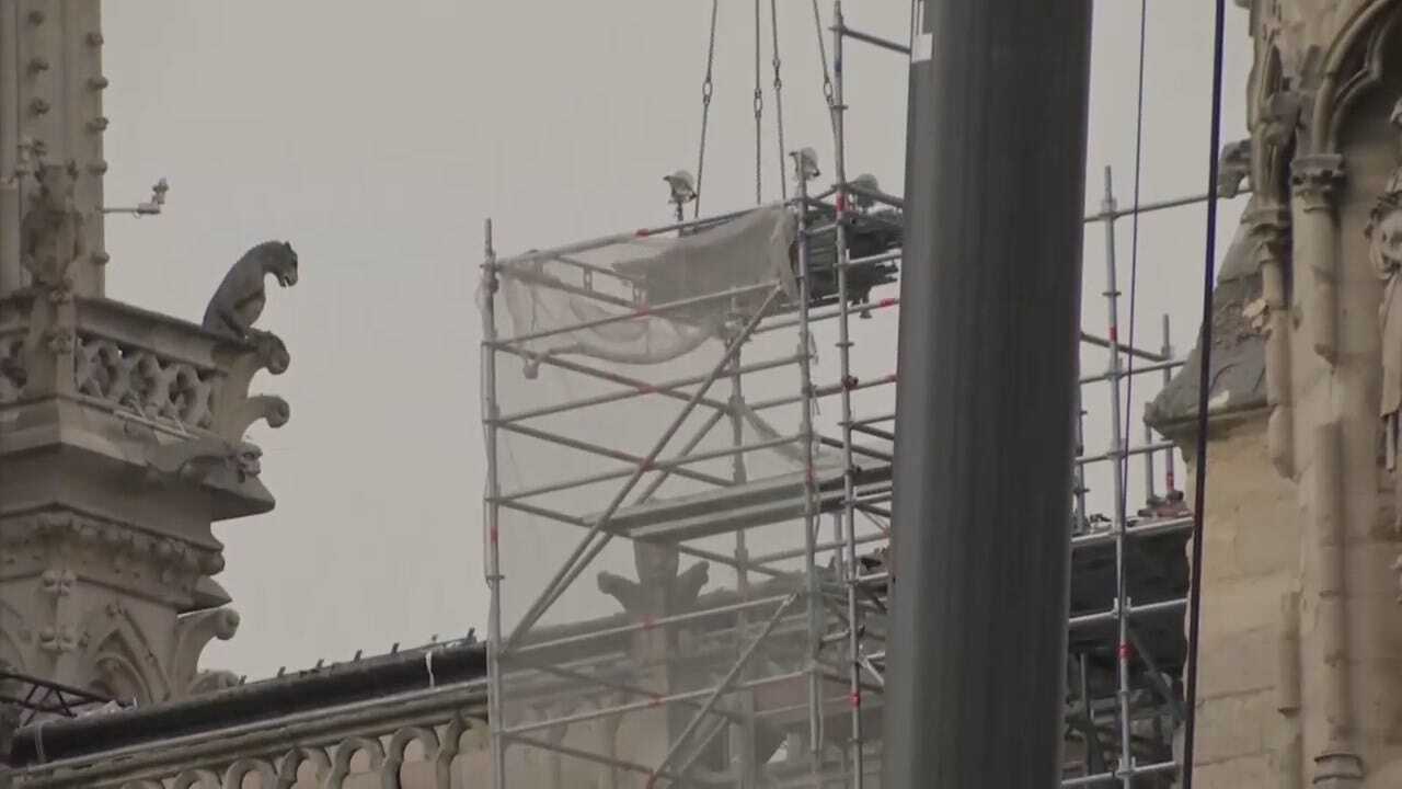 Workers Install Temporary Tarps To Save Notre Dame From Potential Rain Damage