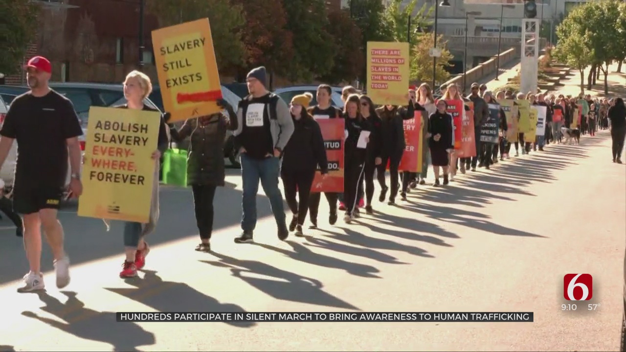 Hundreds Participate In Silent March To Bring Awareness To Human Trafficking